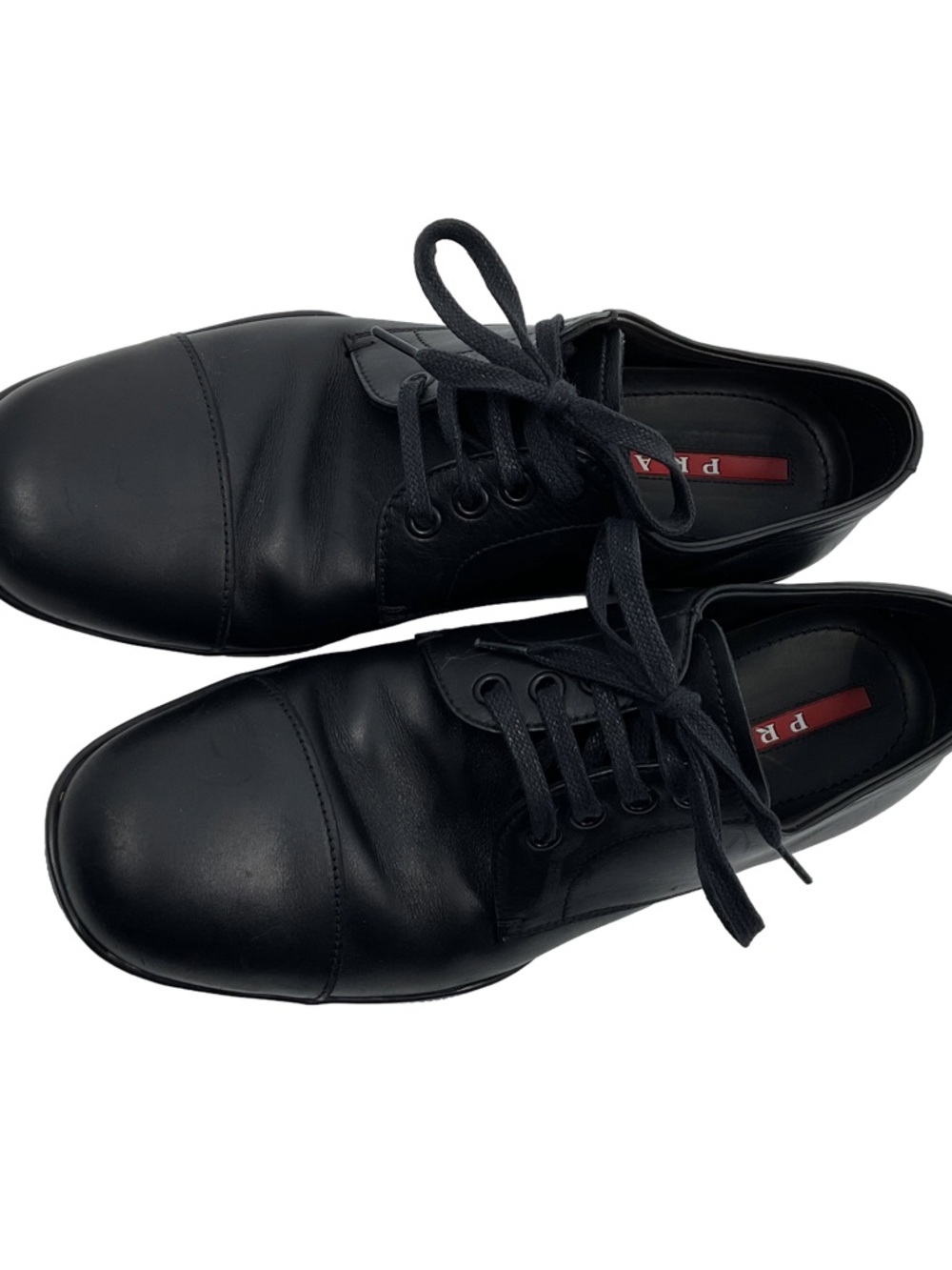 Prada Black Leather Cap-Toe Lace-Up Oxfords with Red Insole Detail